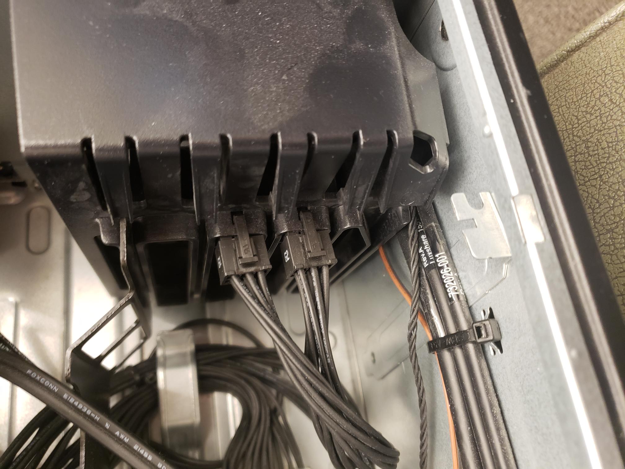 What fan shroud "storage" sockets look like with connectors inserted.